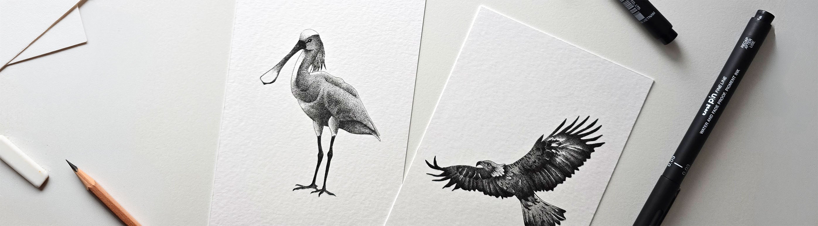 Zwart-witte finelinerdieren getekend op papier